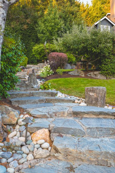 Entryway landscaping. Natural stone steps